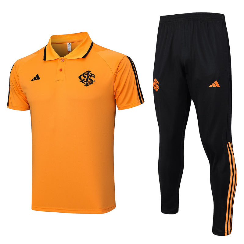 Conjunto Polo Internacional 2023/24 - Laranja